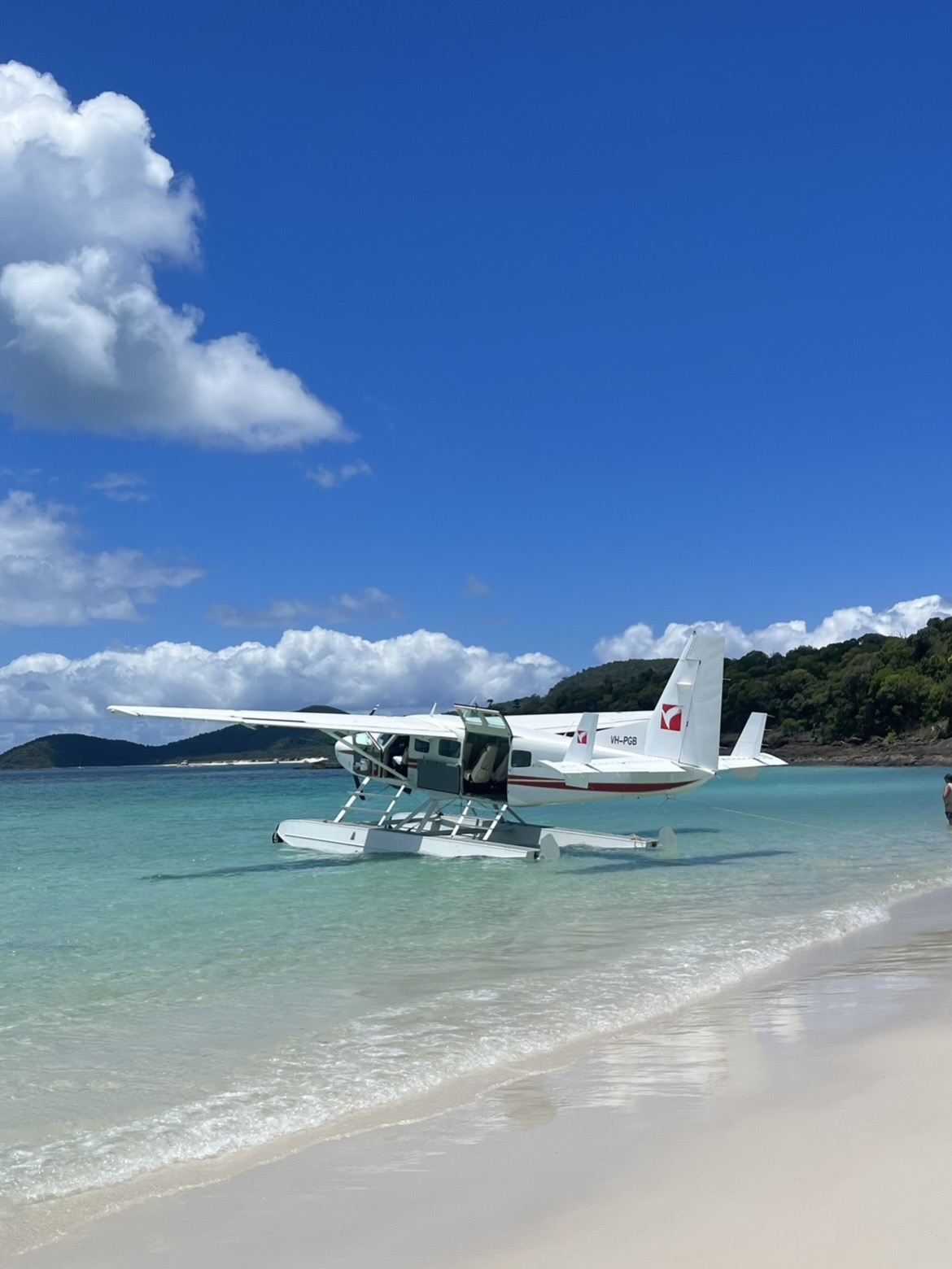 Seaplane on a turquoise shoreline