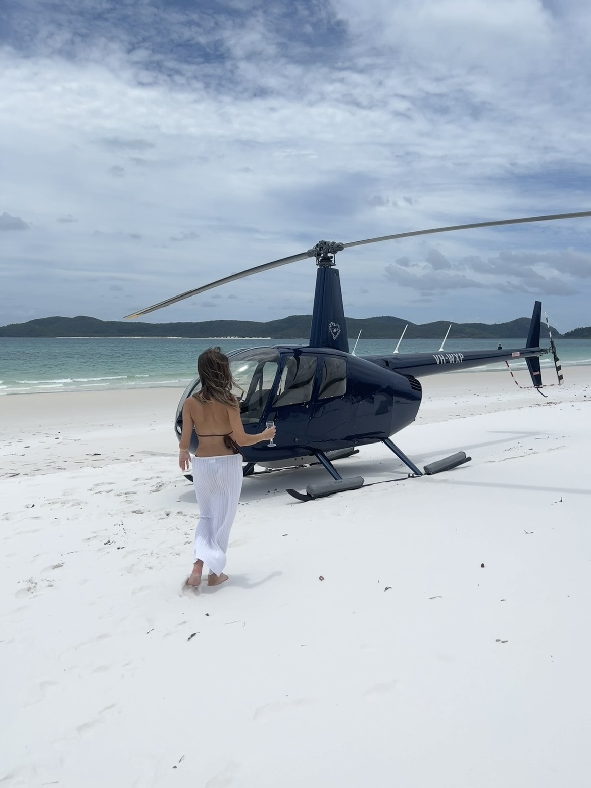 Helicopter on a white sand beach